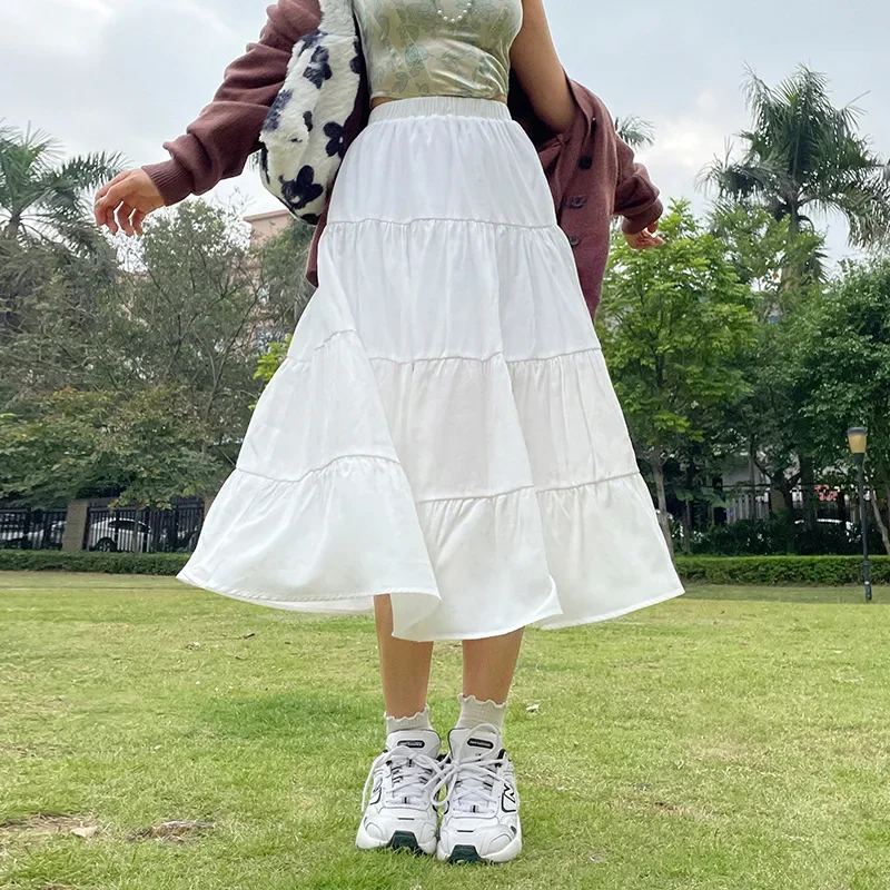 Temperament Fashion Solid Color A-line Casual Skirt 2022 Autumn New Sexy White Pleated Long Skirt Streetwear Women Clothes 2022 summer new women s clothing simulation silk lace up waist short sleeved top wide leg pants suit temperament two piece suit