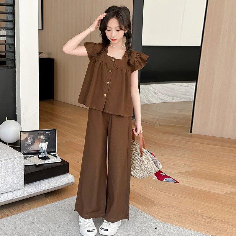 

Комплект из двух предметов для девочек, Новинка лета 2024, детская одежда, модная рубашка с маленькими летающими рукавами и широкие штаны в стиле ретро, комплект