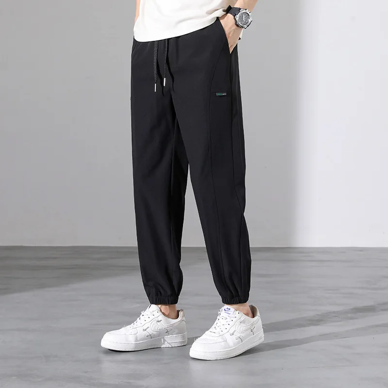 Spring and Autumn Men's Elastic High Waist Solid Pocket Drawstring Harlan Casual Sports Shrink Trousers Office Lady Pants