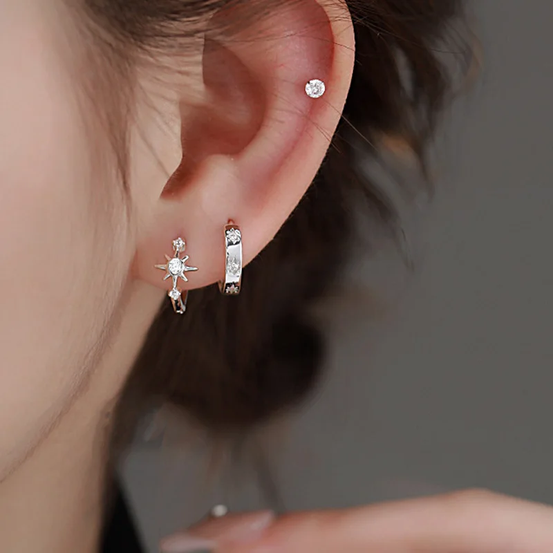 Close-up of zircon star on hoop earring