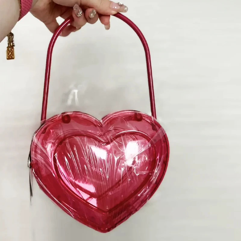 thumbnail image 1 of Bolsos de noche con forma de corazón de melocotón para mujer, bolsos de diseñador de lujo, carteras, novedad 2024, en caja de plástico ABS transparente para el hombro, 1 of 5