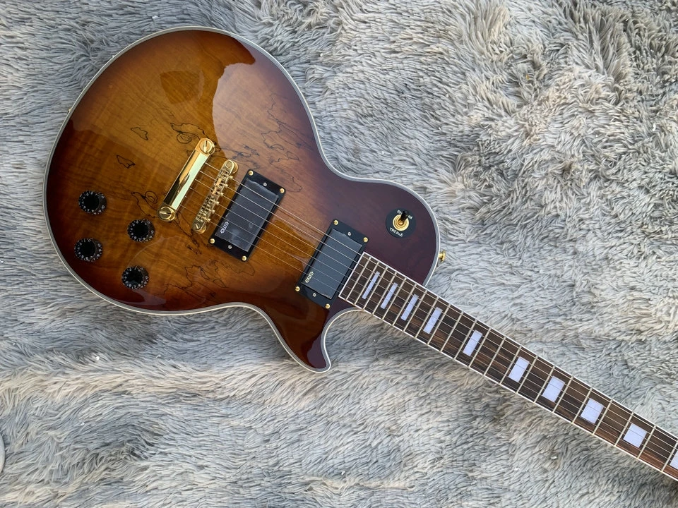 

В наличии Classic custom shop, ЭЛЕКТРИЧЕСКАЯ ГИТАРА LP коричневого цвета, твердый корпус из красного дерева и Шейная гитара