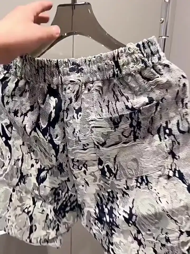 Хлопковые пляжные шорты Nike