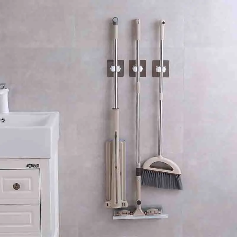 shelf for holding household mops is easy to install without punching