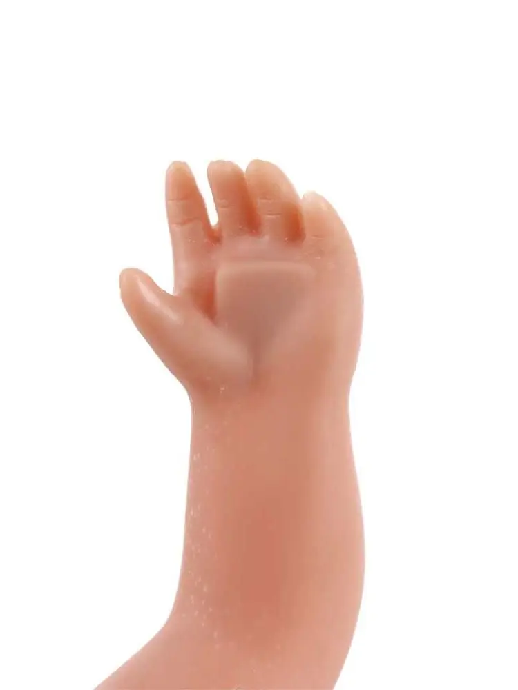 Little hand prop being used to grab a coin