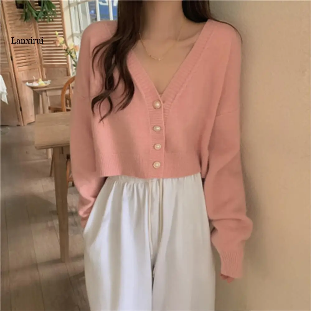 

Женский вязаный кардиган с v-образным вырезом и длинным рукавом