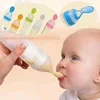 2 PC Baby Accessories Safety Infant Baby Silicone Feeding with Spoon Feeder Food Rice Cereal Bottle Utensils and Fruit Feeder 2