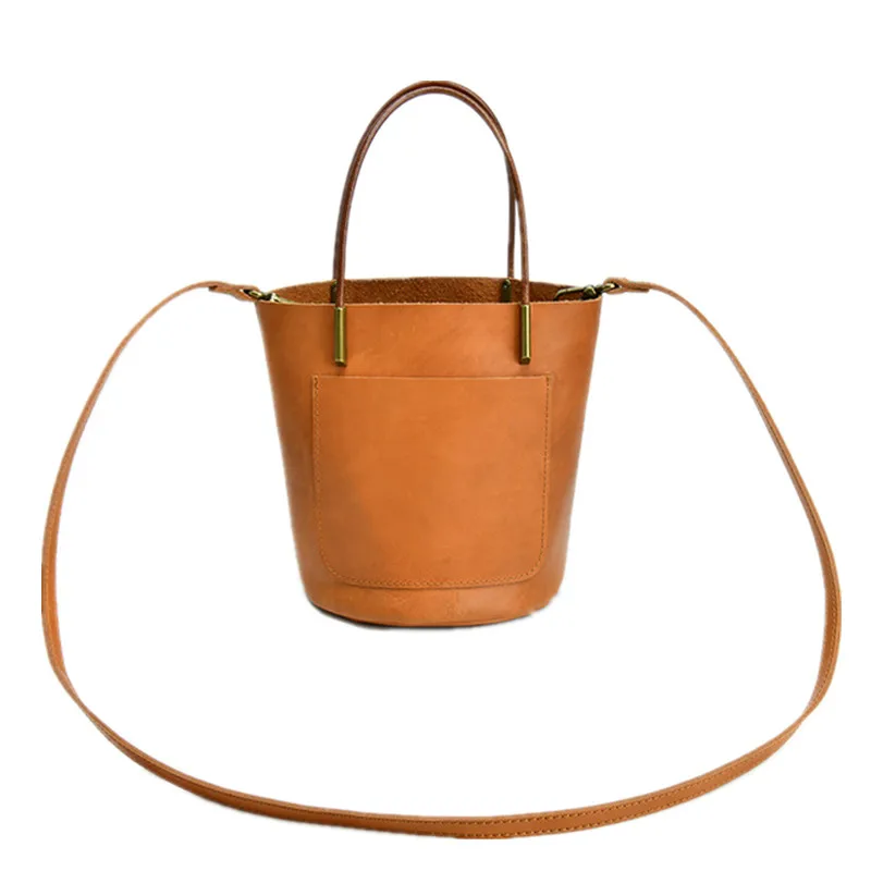 

Leather Tote bag Female bucket bag luxury designer new fashion large capacity hand bill lading shoulder baotou layer cowhide bag