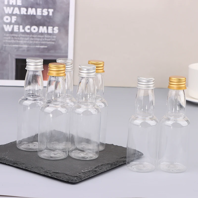 

10Pcs 50ml Mini Clear PET Refillable Small Wine Bottles For Party Wedding Liquor Bottles With Leak Proof Screw Lid