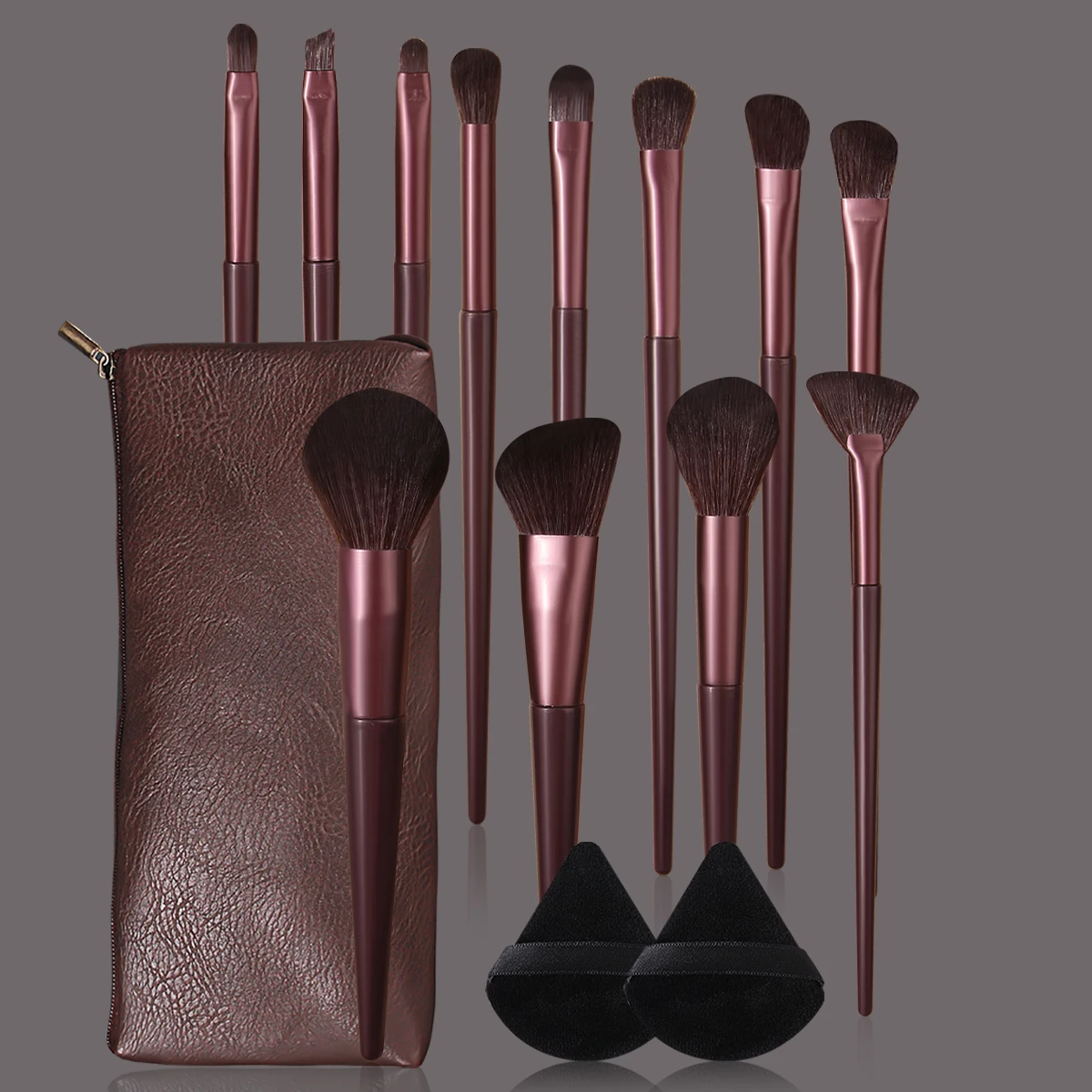 A set of 15 multi-functional makeup brushes +2 non-sticking triangular powder puffs +1 portable makeup brush storage bag