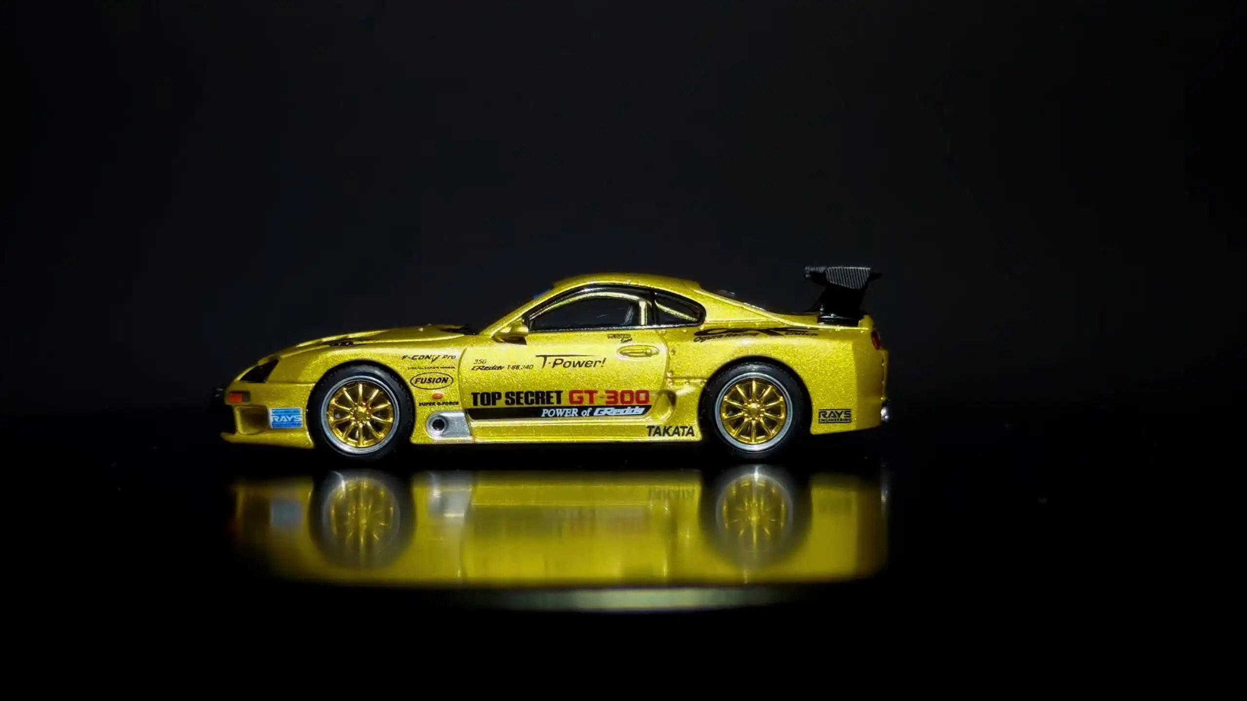 Xcartoys pop race 1:64 top secret gt300 supra a80 cromado ouro