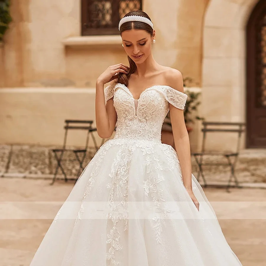 

Exquisite Wedding Dresses Sweetheart Sleeveless Bridal Gowns Lace Appliques Elegant Floor Length Robes Vintage Vestidos De Novia
