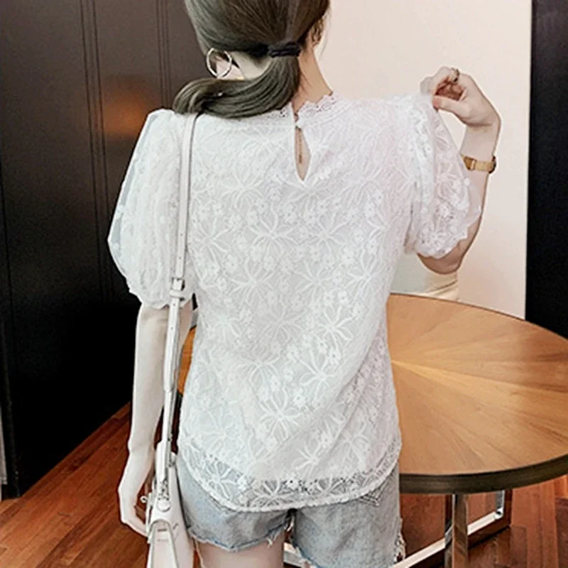 รูปสินค้า เสื้อลูกไม้แฟชั่นเกาหลี แขนพอง ชิลล์ๆ ฤดูร้อน