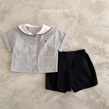 2025 Set di abbigliamento per bambini coreani Set di estate per ragazzi e ragazze Set di camicia a righe con colletto blu scuro in cotone corto da 2 pezzi