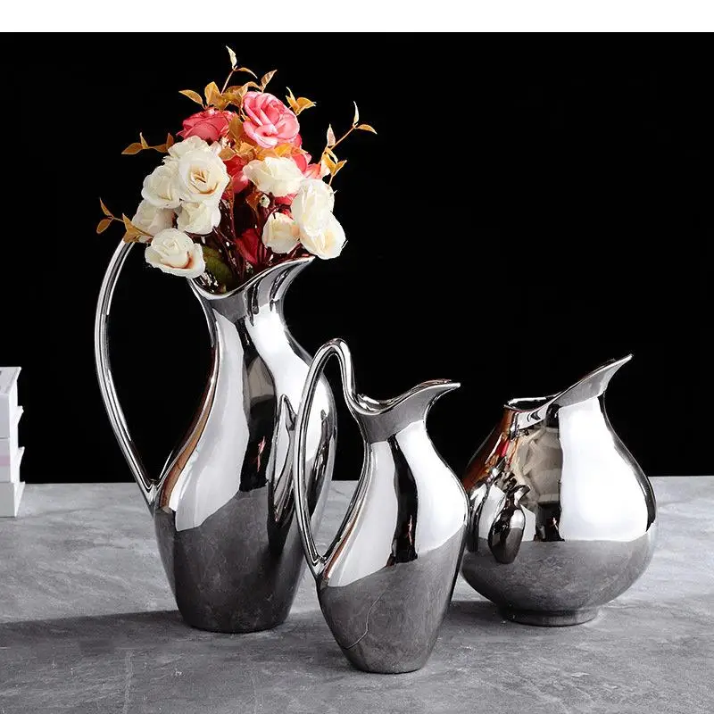 

Серебряная керамическая ваза в форме горшка, искусственные цветы, декоративная Цветочная композиция, современный декор, посеребренные цветочные вазы