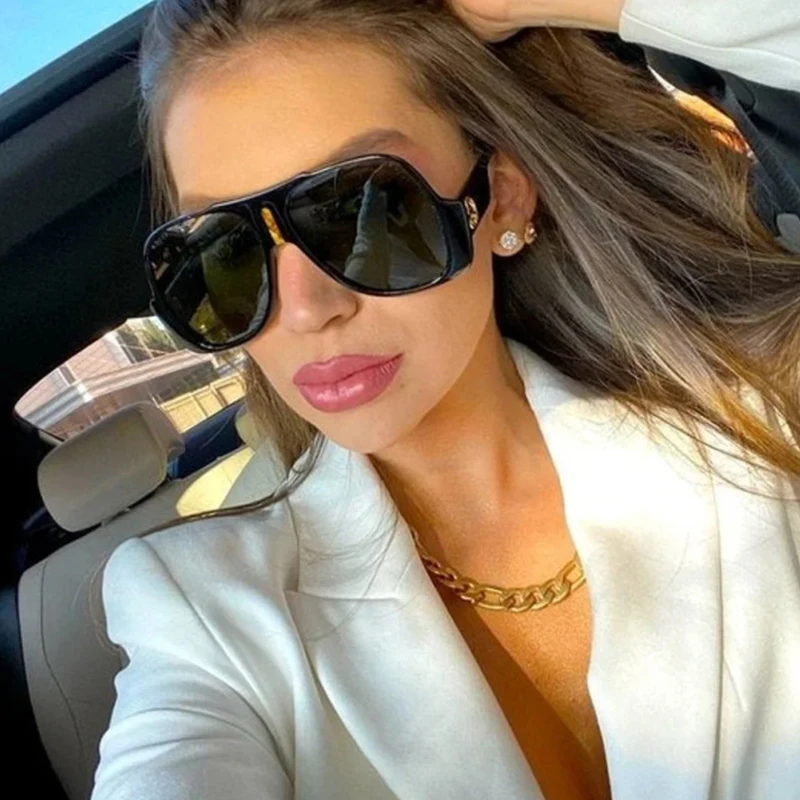 Chic Black Oversized Designer Sunglasses for Women with Oval Lenses