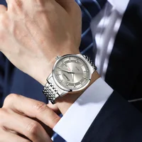 Montre pour hommes entièrement automatique et Non mécanique, évidée, étanche, tendance, brille dans la nuit, double calendrier 5