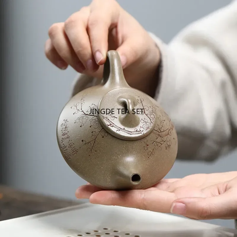 160ml Yixing Yixing Zisha teapot hand carved plum blossom stone spoon tea drinking pot China