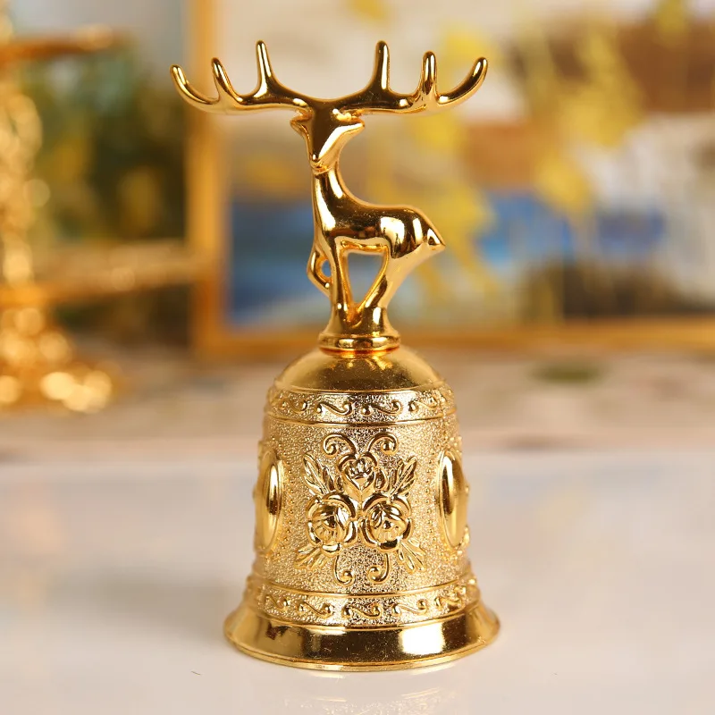 

Gold Reindeer Hand Bell Christmas Gifts Engraved Antique Loud and Clear Sound Church Bronze Bell Home Dining Table Decoration