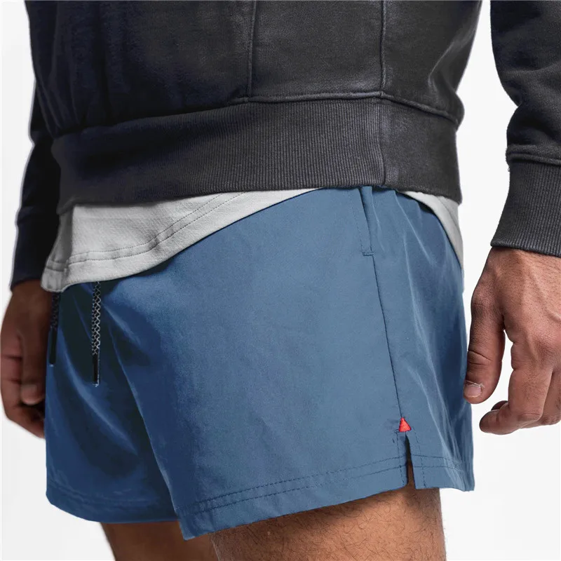 2023 New Summer Men's Sports Shorts Loose Running Gyms Workout Training Breathable Quick drying Shorts Man Brand Short Pants