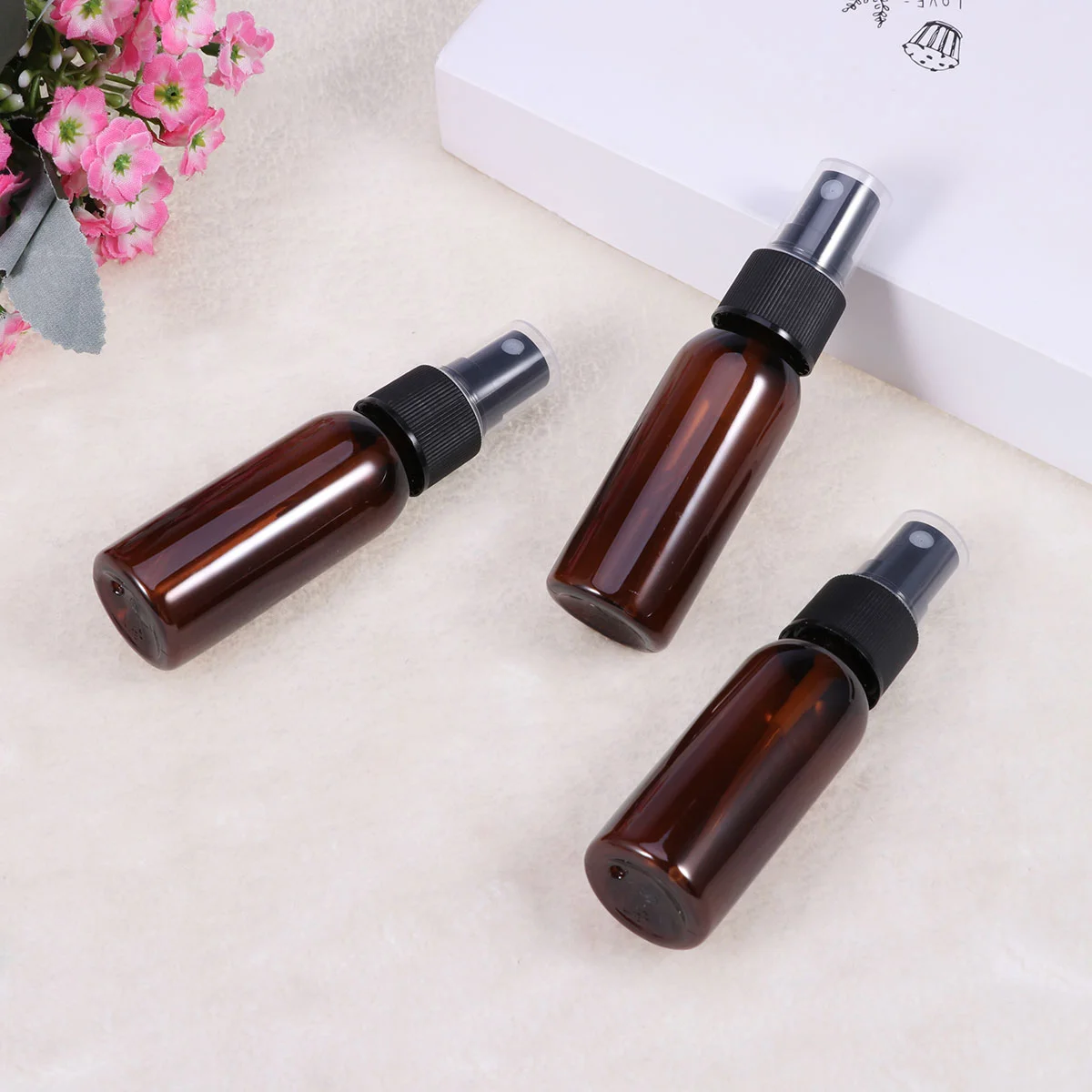 

10/20pcs Mini Brown Plastic Press Pump Small Empty Spray Bottle Skin Care Make Up Container Oils Liquid Perfume Atomizer