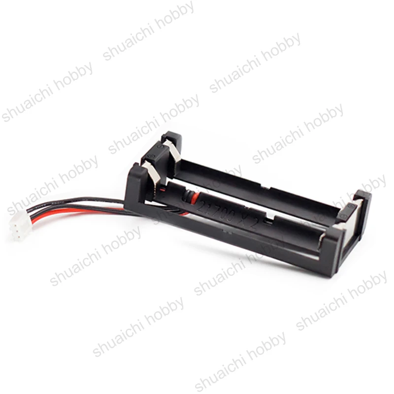 Gros plan sur le support batterie 21700 2 emplacements pour Jumper T18 drone FPV, connecteurs et sangles visibles.