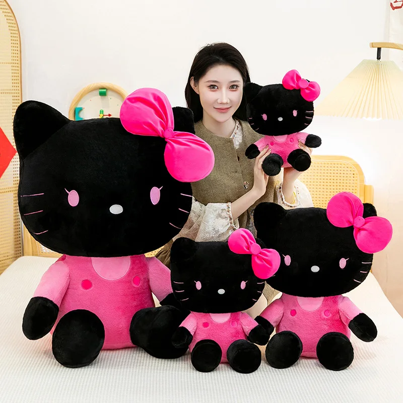دمية محشوة هلو كيتي (Hello Kitty) باللون الأسود وا...