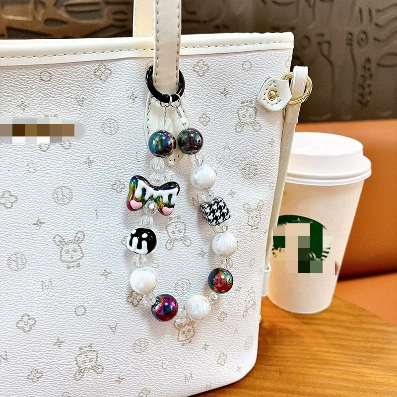 Elegant Anti-Lost Beaded Phone Charm Wrist Strap with Bow Accent