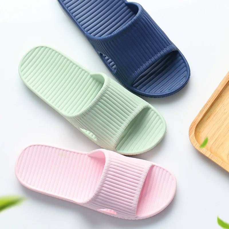 

High-end home slippers for men and women, new EVA slippers with a sense of stepping on shit, couples home bathing men's slippers