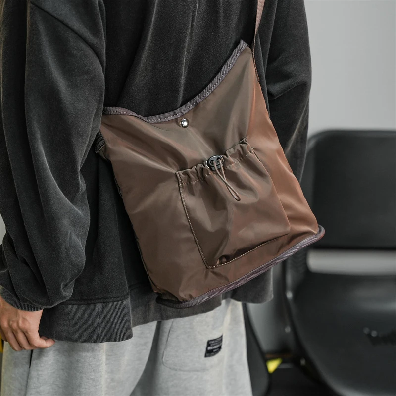 

New Korean Drawstring Crossbody Bag for Men Women Trend Versatile Bucket Bag Student Lightweight Nylon Casual Shoulder Bag