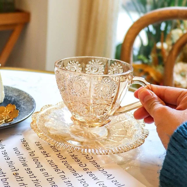 Glass cups + saucers (set of 2)