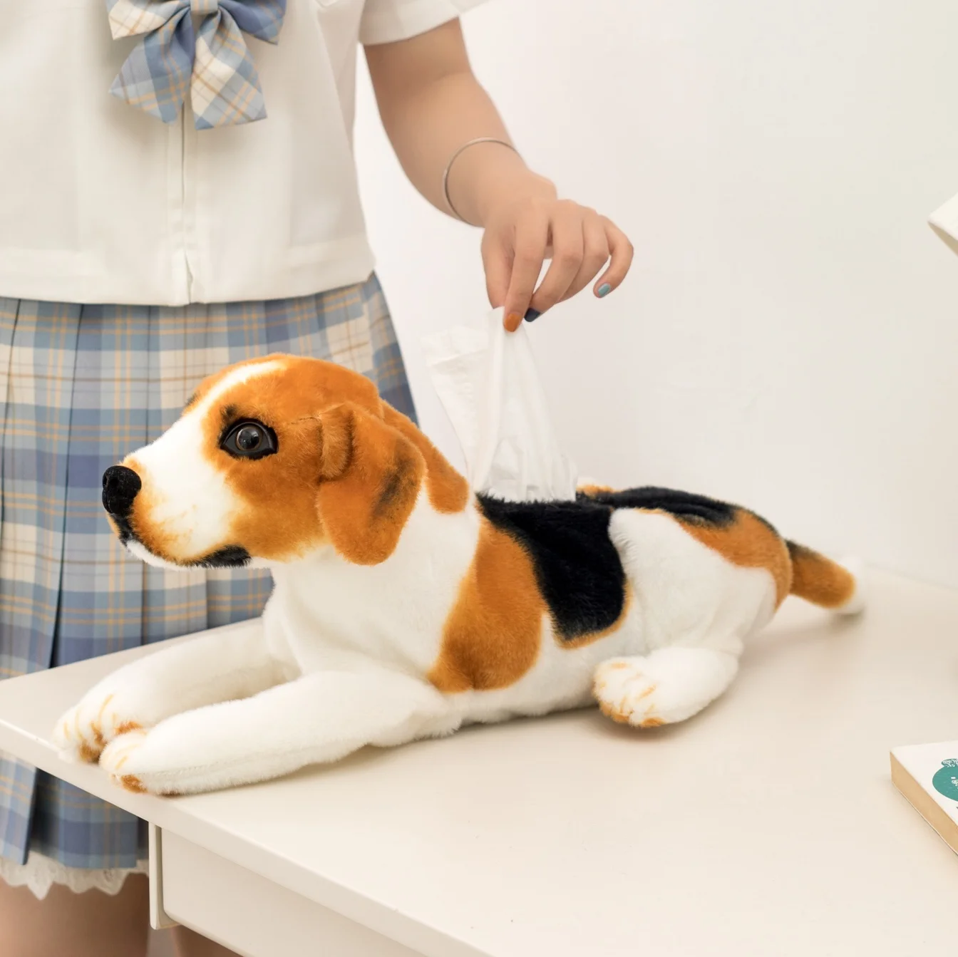 Assorted lifelike animal plush tissue box holders including Dalmatian and Beagle dogs, tigers, and leopards for car decor.