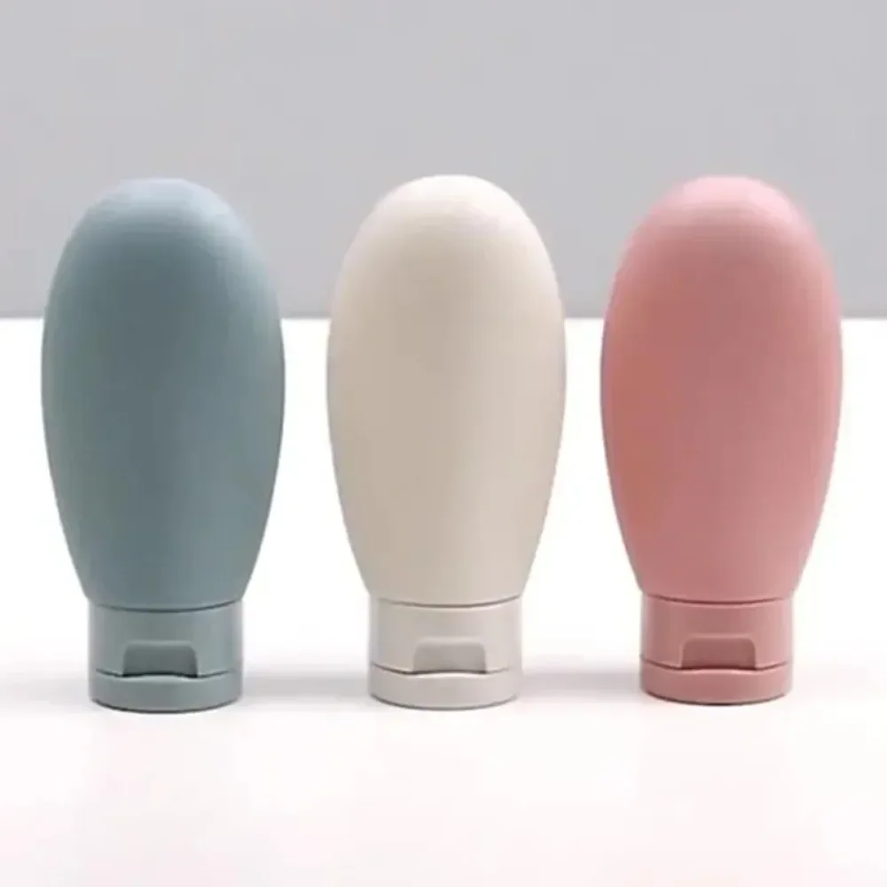 Travel Size Refillable Cosmetic Bottles - 4 Pack Squeeze Tubes for Creams, Lotions, and Shampoo