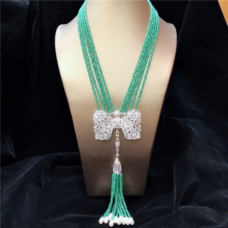 

Hand knotted multilayer noble white natural freshwater pearl green stone micro inlay zircon tassel necklace fashion jewelry