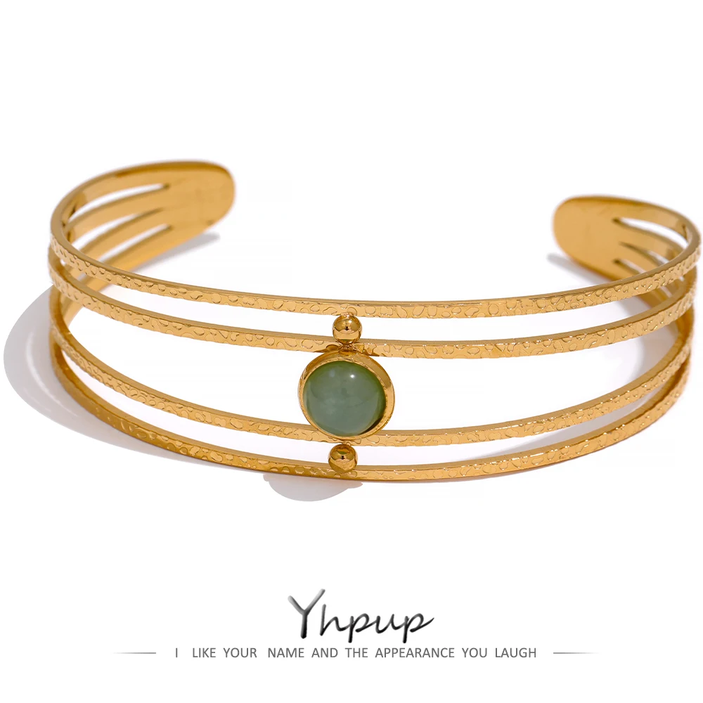 Open bracelet, arm cuff in gold color, water-resistant, green stone