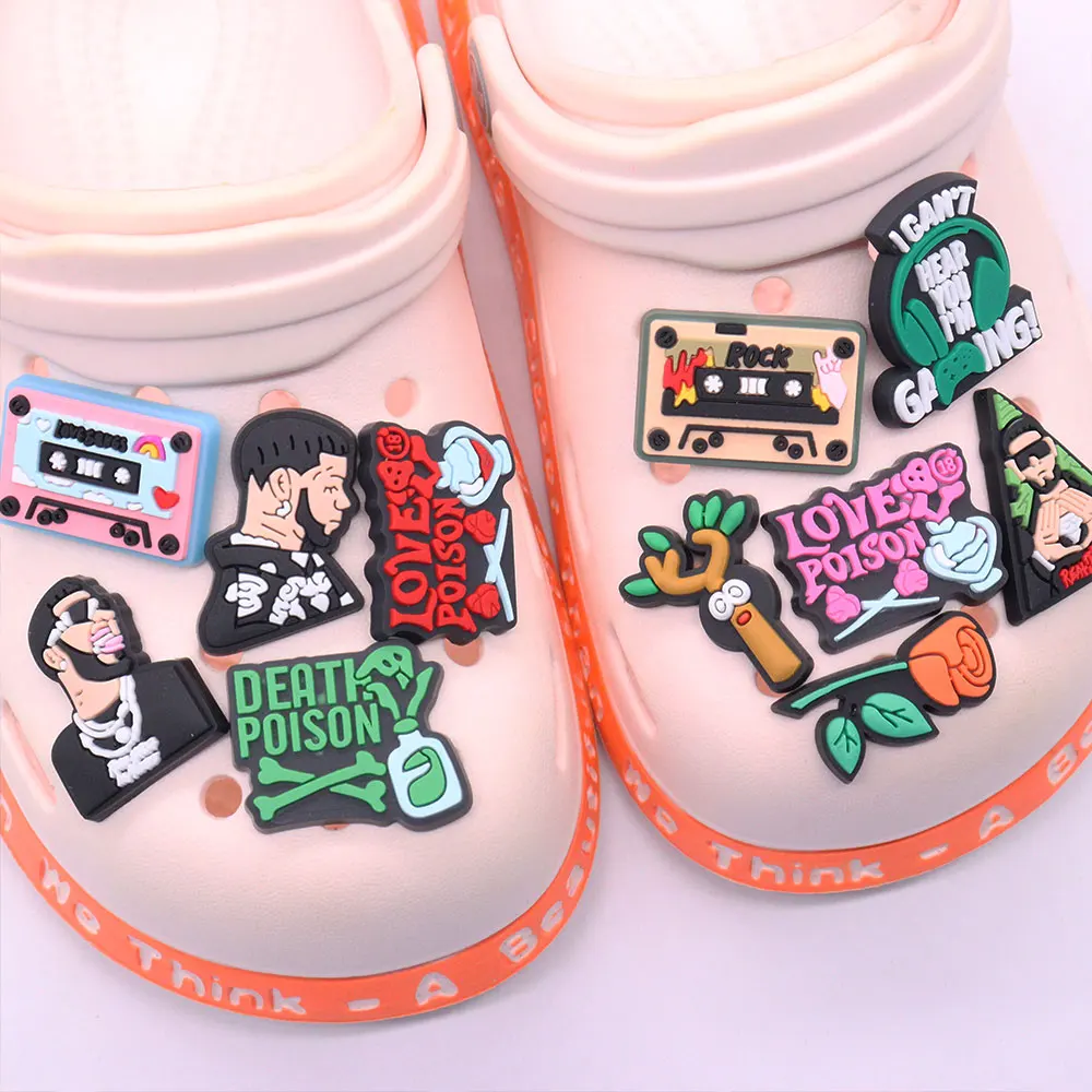 

Wholesale 50pcs PVC Shoe Charms Rose Love Fashion Cool Man Tape Accessories Sandal Decoration For Croc Jibz Kids X-mas Gift