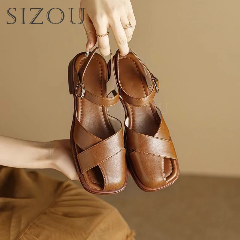 

2024 Summer New French Retro Sense One Word Buckle Strap Sandals Female Middle Heel Thick Heel Hollow Soft Bottom Roman Sandals