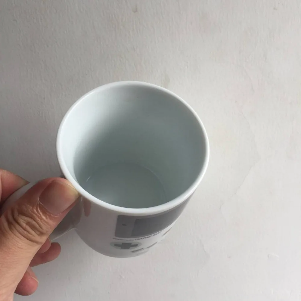 Funny Heat Sensitive Game Mugs Ceramic Boy Mug Home Office White Porcelain Milk Beer Coffee Mug Color Changing Drinkware ceramic drinking cup ceramic cup ceramic mug ceramic coffee cup beer mug coffee cup