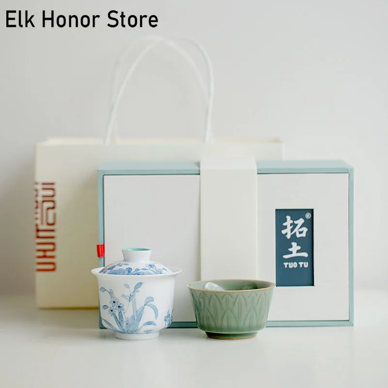 

Luxury Pure Hand Painted Orchid Ceramic Tea Set Handmade Engrave Yue Kiln Celadon Lotus Throne Tea Cup Kung Fu Tea Set Gift Box