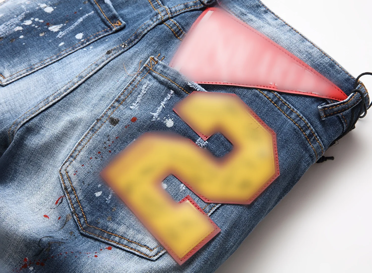 Europe and the United States new ragged line splash paint men's slim hole big badge elastic straight tube male jeans
