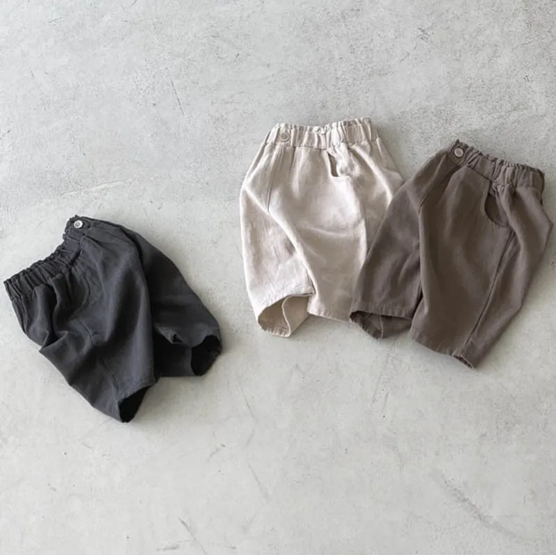 Description Picture 5 of item2025 Summer New Baby Solid Color Shorts Loose Children Casual Pants Fashion Boys Girls Cotton Shorts Infant Clothes