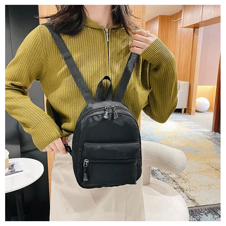 حقائب ظهر نسائية صغيرة عصرية من النايلون حقيبة نسائية حقائب مدرسية صغيرة حقيبة ظهر بيضاء للفتيات المراهقات الموضة