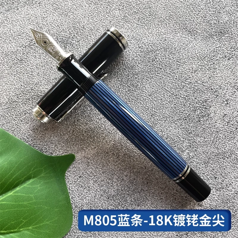 ペリカンゴールドペン先ピストン万年筆、黒緑色ストリップ、青