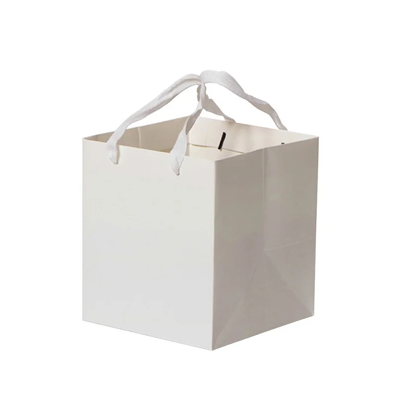 

Оптовая продажа, бумажный пакет, упаковка, цветок, свадебный подарок, квадратный бумажный пакет для покупок с ручкой из веревки, принимаем индивидуальный логотип