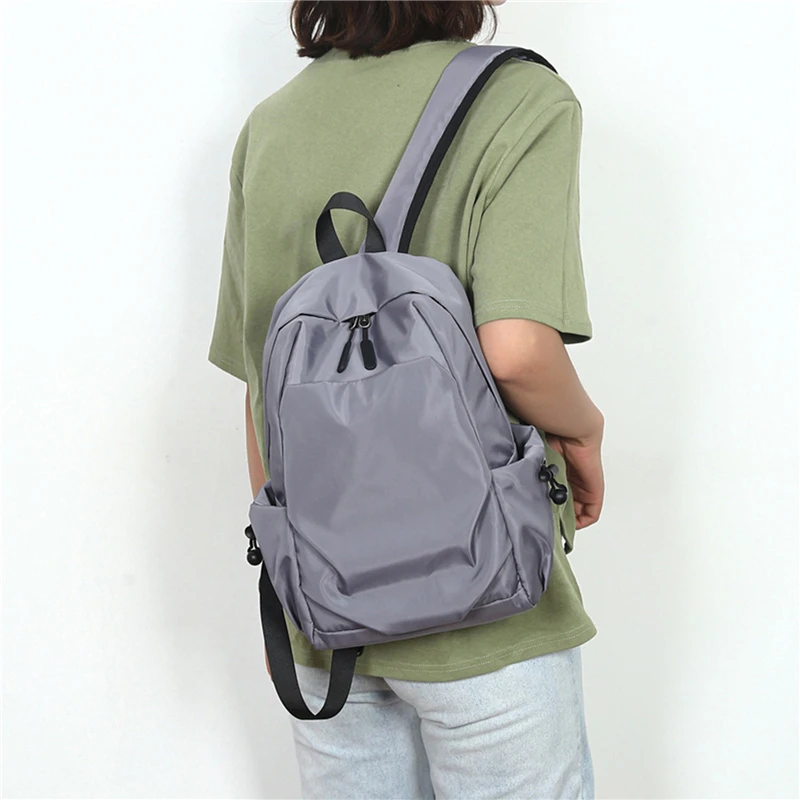 Mochila de ombro preto pequena masculina, mochila escolar para homem, mochila esportiva, designer de lona, impermeável, mini, moda, 2024