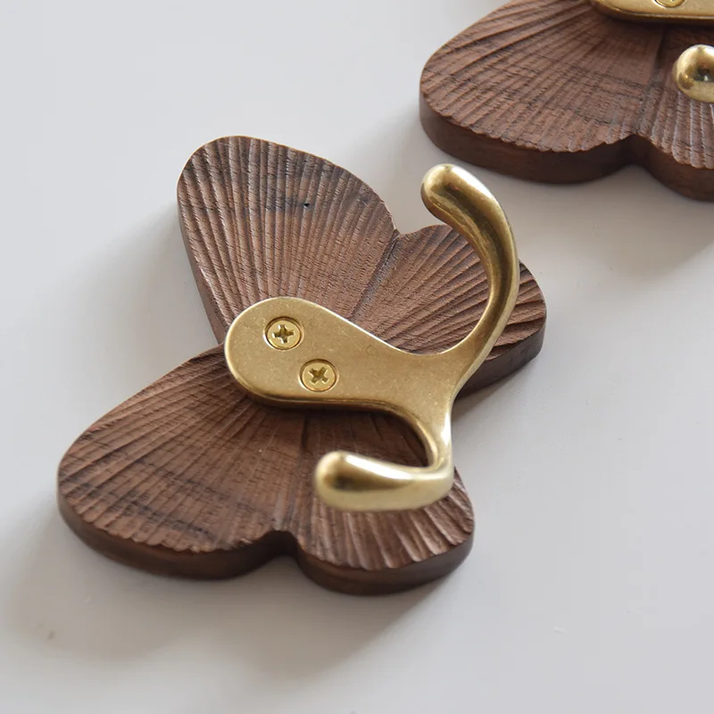 

Butterfly solid wood hook creative black walnut no mark sticky hook coat cap hook black walnut door back hook beech hanging