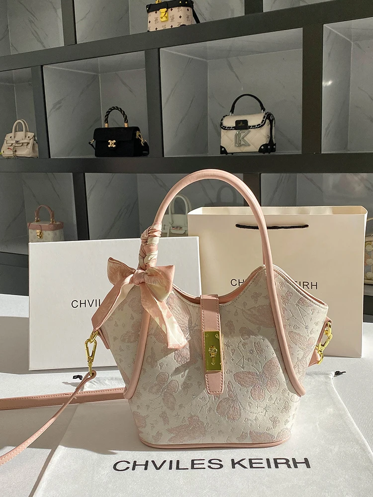 حقيبة حمل جلدية محمولة للنساء، تتميز بطباعة زهور ر...