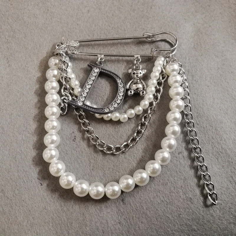 Prada Faux Pearl Sterling Silver Brooch in White | Lyst UK