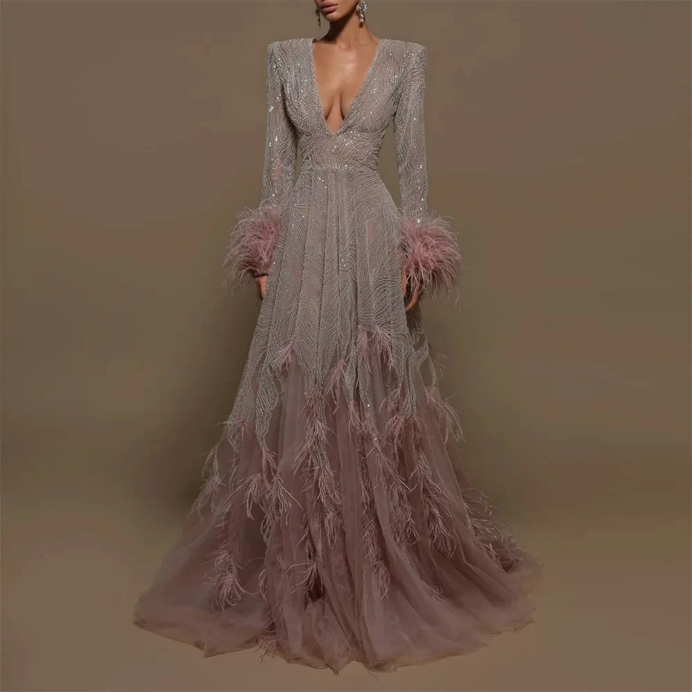 

Celebrity A-line deep V-neck Dubai star party dress long-sleeved black feather floor-length skirt wedding prom dress Arabian