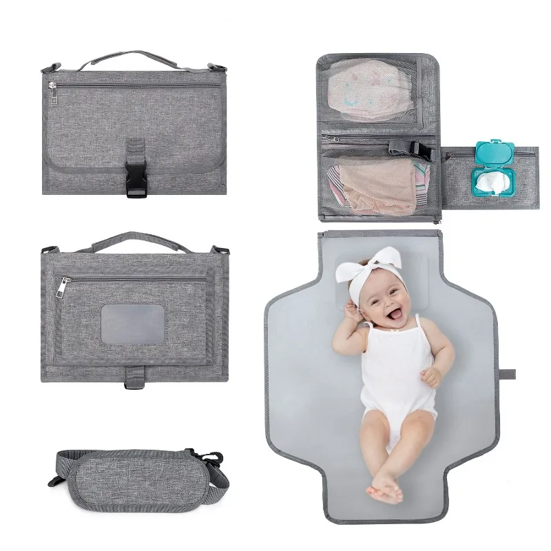 

Portable baby diaper pad supplies outdoor travel folding nappy includes shoulder strap wipes pocket design